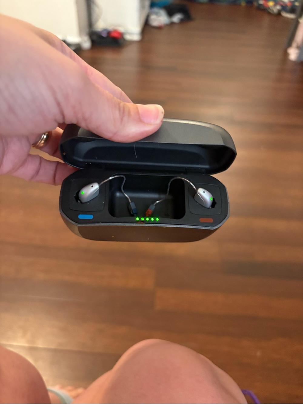 Wireless In-Ear Rechargeable Earbuds with Black Charging Case and Silver Buds